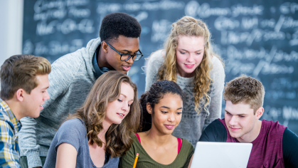 Students around computer